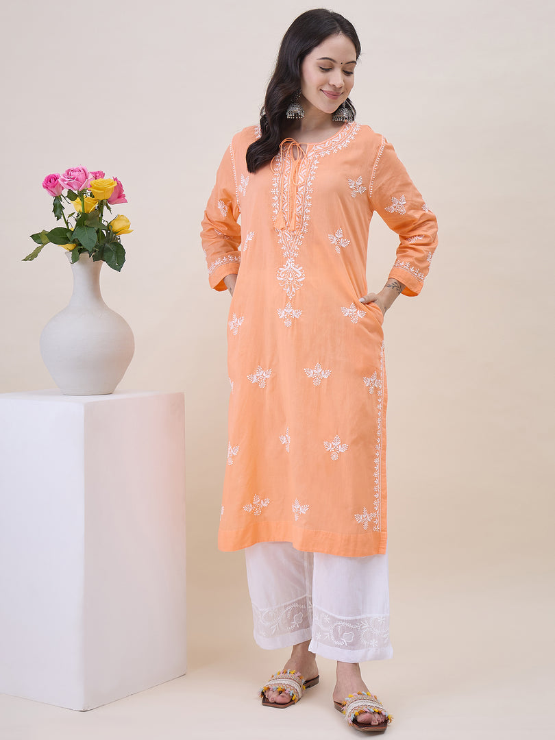 Peach chikankari cotton round neck kurta with front ties and side pockets