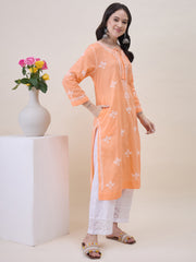 Peach chikankari cotton round neck kurta with front ties and side pockets