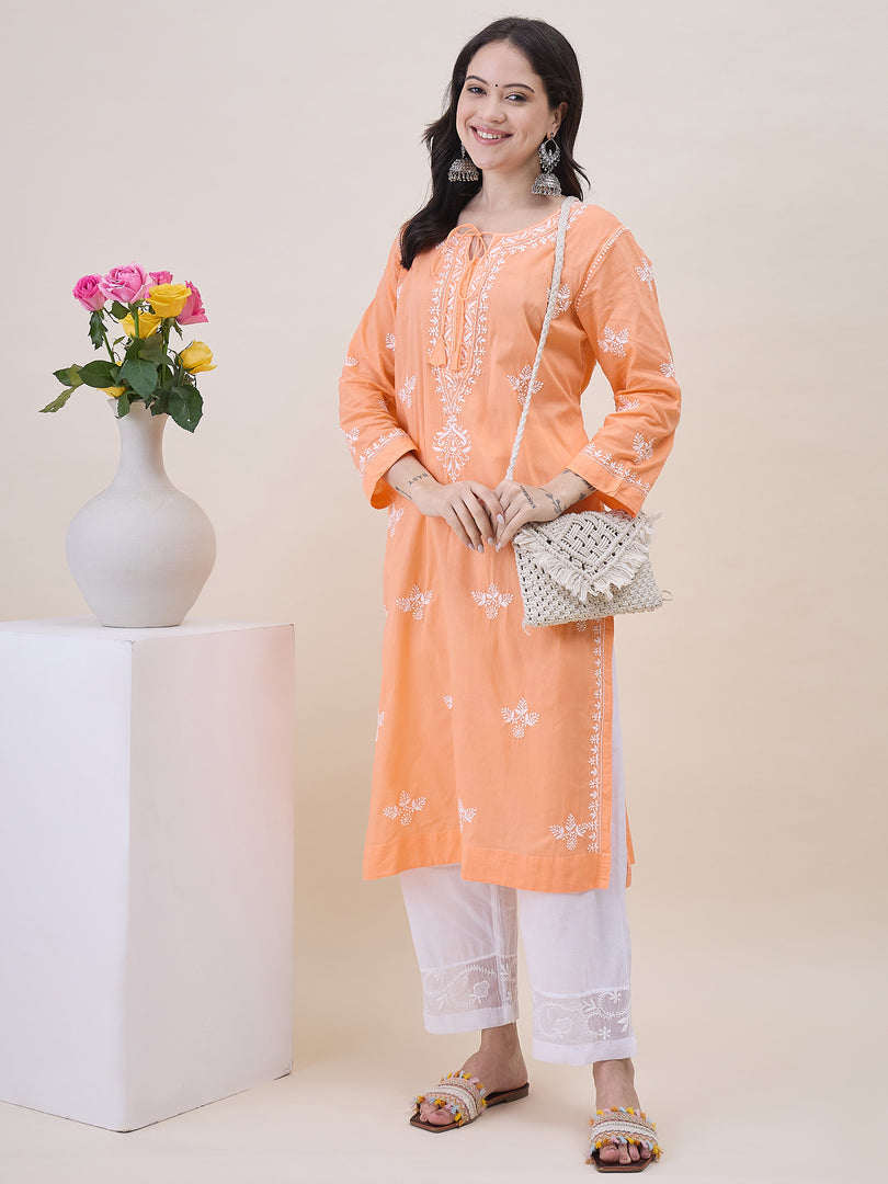 Peach chikankari cotton round neck kurta with front ties and side pockets