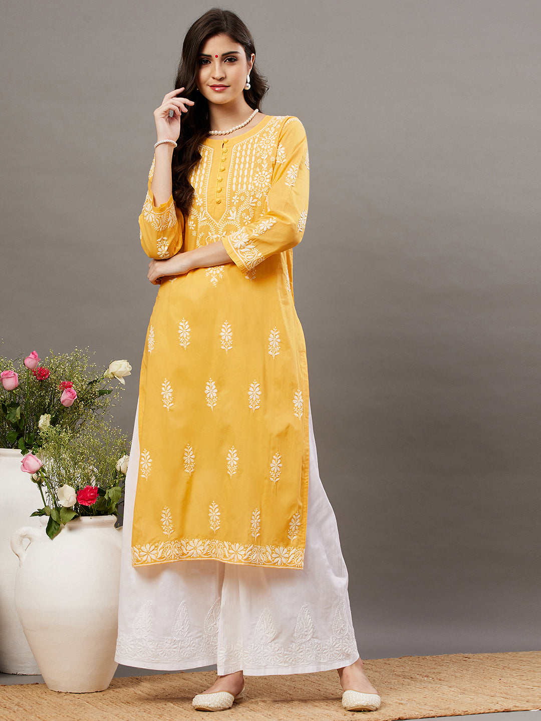 Turmeric yellow cotton round neck kurta with chikankari