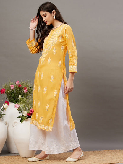 Turmeric yellow cotton round neck kurta with chikankari