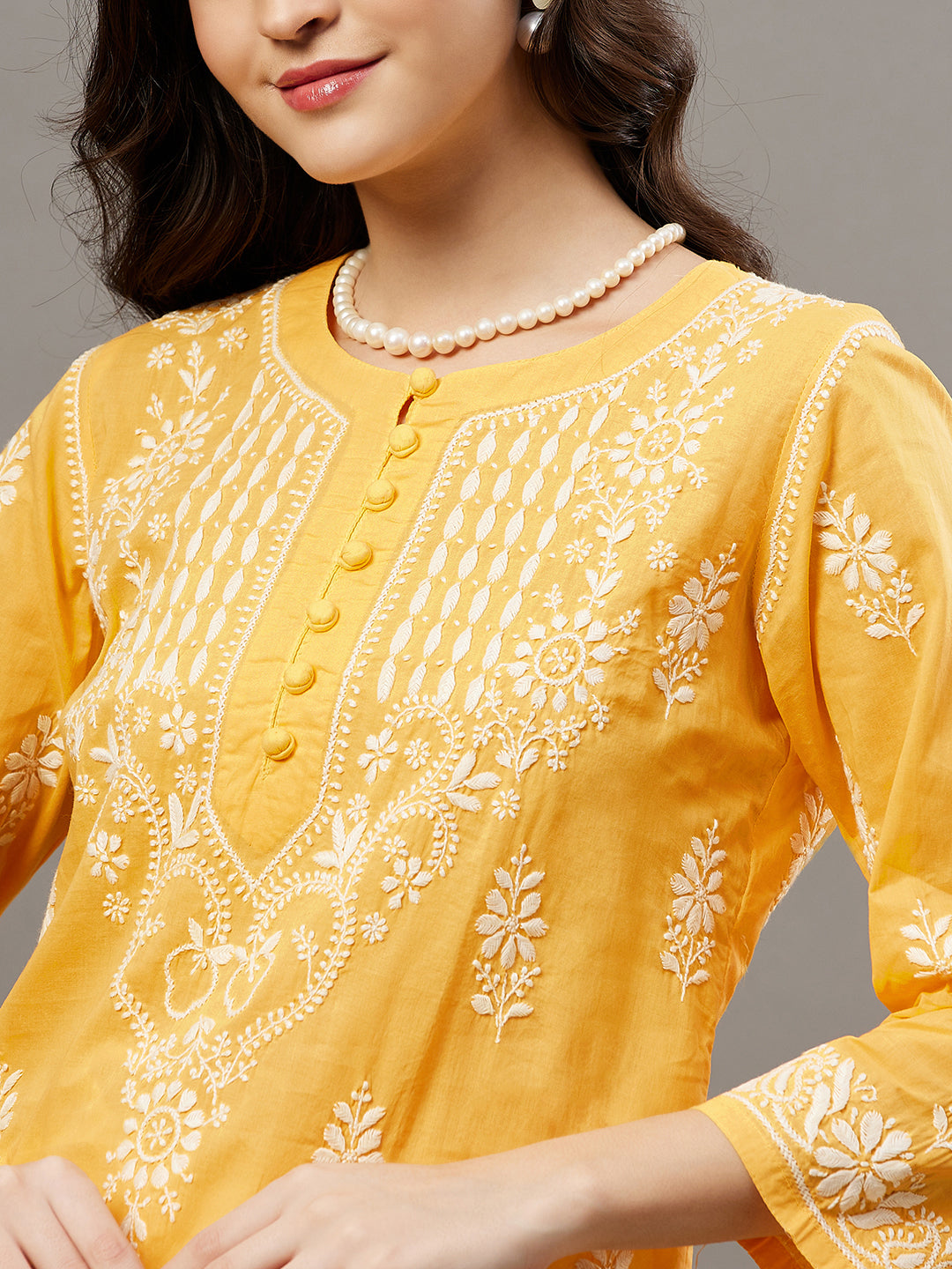 Turmeric yellow cotton round neck kurta with chikankari