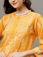 Load image into Gallery viewer, Mustrad yellow round neck cotton chikankari kurta - Rakhi Apparels

