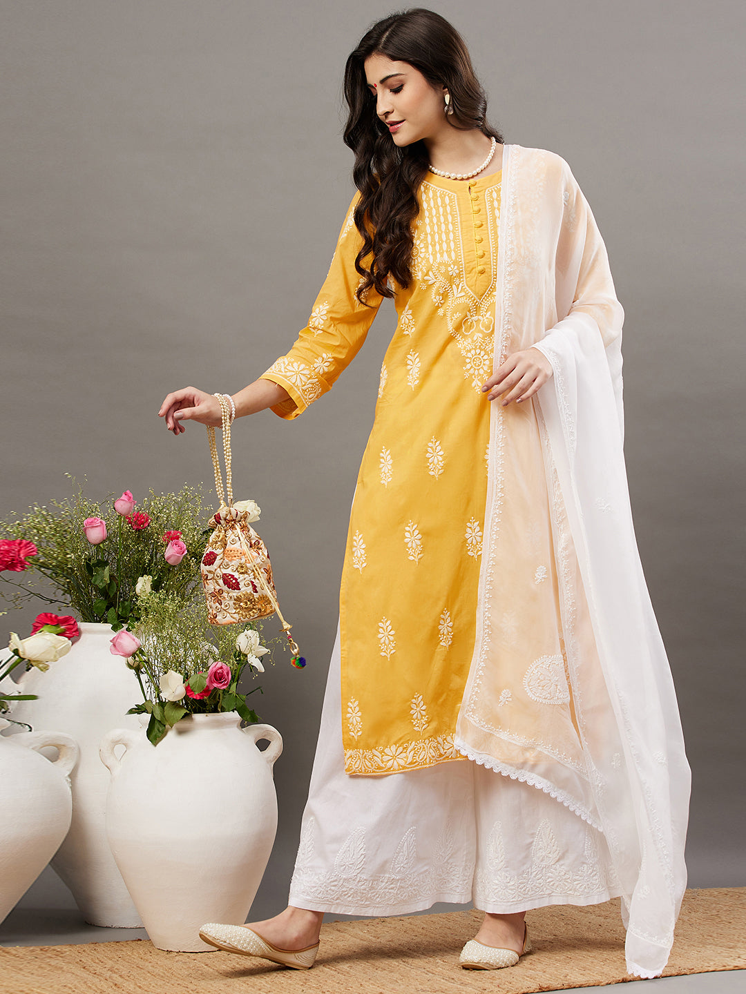 Turmeric yellow cotton round neck kurta with chikankari