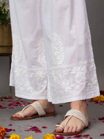 Load image into Gallery viewer, White cotton palazzo with floral pattern
