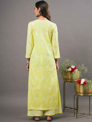 Yellow cotton kurta with chikankari and back ties with shararaset of 2