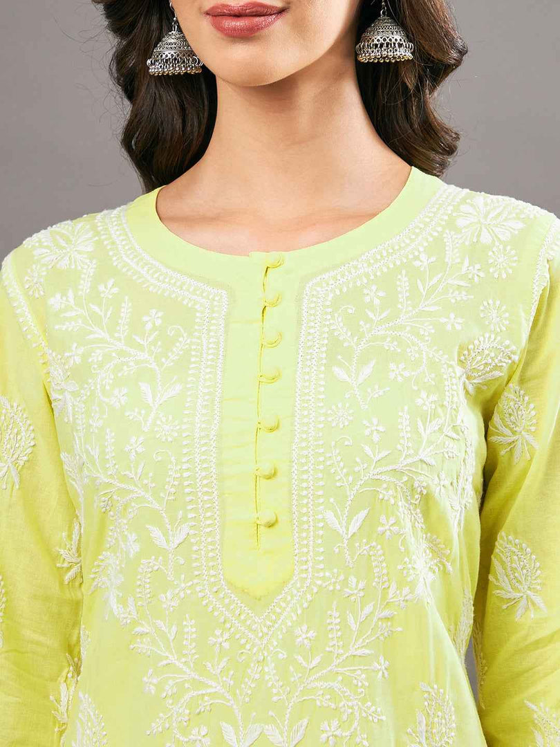 Yellow cotton kurta with chikankari and back ties with shararaset of 2