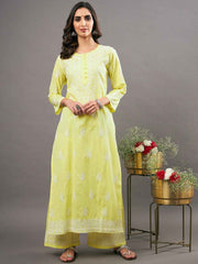 Yellow cotton kurta with chikankari and back ties with shararaset of 2